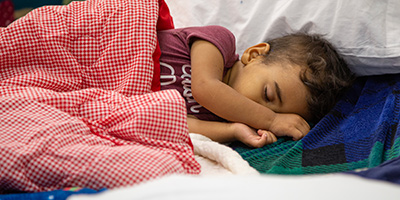 kid-sleeping-welcome-center-400x200.jpg